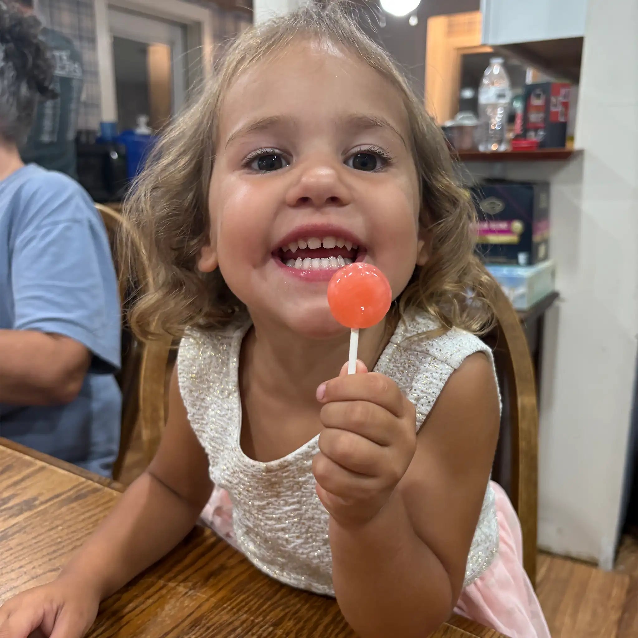 Smiling Girl with Zollipop