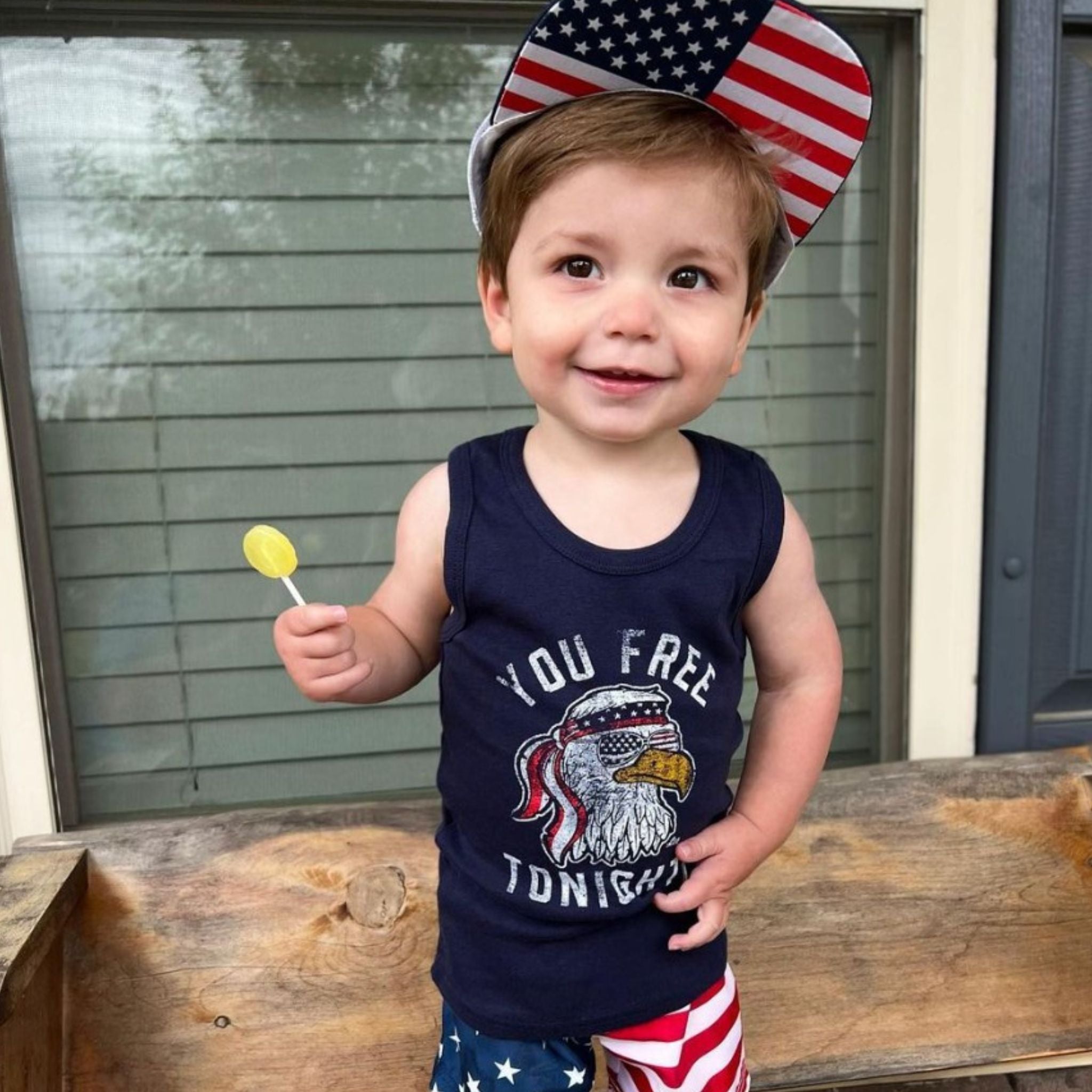 Child with zollipop.