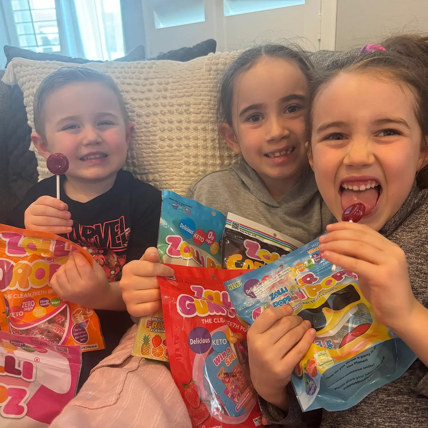 Children eating zolli candy.