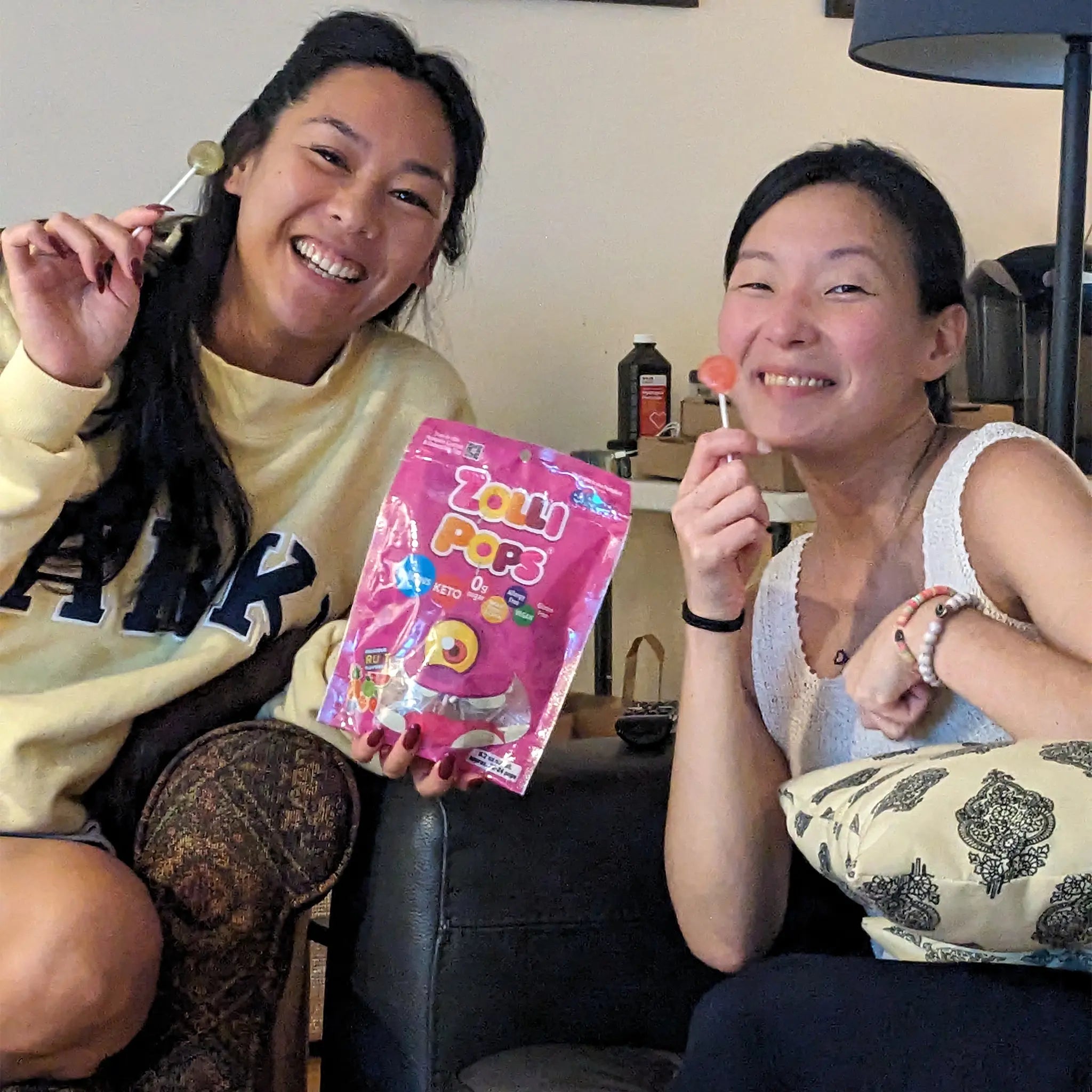 Women with zolli candy bag and lollipops.